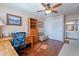 Comfortable home office with wood furnishings and ceiling fan at 8260 E Keats Ave # 508, Mesa, AZ 85209