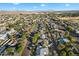 Aerial view of a residential area with houses, streets, and a baseball field at 8307 E Weldon Ave, Scottsdale, AZ 85251