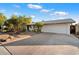 Appealing single-story home with an attached garage and easy-care landscaping at 8307 E Weldon Ave, Scottsdale, AZ 85251