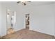 Spacious bedroom with carpet, door to laundry, and access to another room at 8865 E Baseline Rd # 1129, Mesa, AZ 85209