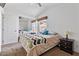 Main bedroom with mirrored closet doors and ceiling fan at 8865 E Baseline Rd # 1129, Mesa, AZ 85209