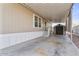 Covered carport with storage shed and access to the home at 8865 E Baseline Rd # 1129, Mesa, AZ 85209