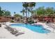 Relaxing freeform community pool with surrounding patio at 8865 E Baseline Rd # 1129, Mesa, AZ 85209