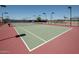 Well-maintained tennis courts with modern lighting at 8865 E Baseline Rd # 1129, Mesa, AZ 85209