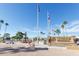 Veterans Memorial entrance with fountain and flagpoles at 918 S Ember Cir, Mesa, AZ 85208