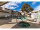 Community pool with hot tub, lounge chairs, and a view of the surrounding buildings at 220 N 22Nd Pl # 1108, Mesa, AZ 85213