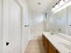 Bathroom with dual sinks, a bathtub, and modern fixtures at 3636 E Stampede Dr, Gilbert, AZ 85297