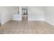 Open dining area with tiled floor, ready for a dining table and chairs at 3636 E Stampede Dr, Gilbert, AZ 85297