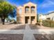 Front exterior of a two-story home with a paved walkway leading to the entrance at 3636 E Stampede Dr, Gilbert, AZ 85297