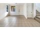 Empty living room with tiled floor, ready for furniture and personal touches at 3636 E Stampede Dr, Gilbert, AZ 85297