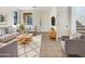 Living room with comfortable seating, stylish rug, and modern decor at 3636 E Stampede Dr, Gilbert, AZ 85297