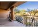 Spacious balcony with scenic desert views and native plants at 36601 N Mule Train Rd # B14, Carefree, AZ 85377