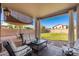 Covered patio with seating area and view of the backyard at 4660 E Torrey Pines Lane Ln, Chandler, AZ 85249