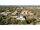 An aerial view of a home in a desert landscape with surrounding houses at 512 E Tanya Trl, Phoenix, AZ 85086