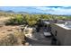 Aerial view of the backyard featuring a hot tub, patio, and desert landscaping at 512 E Tanya Trl, Phoenix, AZ 85086