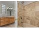 View of the bathtub and shower through open doorway at 512 E Tanya Trl, Phoenix, AZ 85086