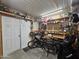 Garage with workbench, bicycle and storage at 650 N Hawes Rd # 4412, Mesa, AZ 85207