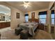 Relaxing main bedroom with attached bathroom and ample natural light at 650 N Hawes Rd # 4412, Mesa, AZ 85207