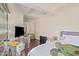 Bedroom with a desk, bed, and moving boxes at 7151 E Rancho Vista Dr # 4001, Scottsdale, AZ 85251