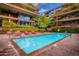 Inviting community pool with ample space for lounging and swimming at 7151 E Rancho Vista Dr # 4001, Scottsdale, AZ 85251
