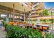 Outdoor patio area with orange furniture and a water feature at 7151 E Rancho Vista Dr # 4001, Scottsdale, AZ 85251