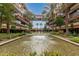 Courtyard with water feature, palm trees, and walkways at 7151 E Rancho Vista Dr # 4001, Scottsdale, AZ 85251