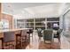 Kitchen with granite counters, stainless steel appliances, breakfast bar, and large windows at 7151 E Rancho Vista Dr # 4001, Scottsdale, AZ 85251