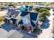 Aerial view of a neighborhood with multiple houses, showcasing the community's layout and style at 735 E Calavar Rd, Phoenix, AZ 85022