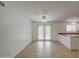 Dining area with tiled flooring, ceiling fan, and sliding glass doors at 7431 W Ocotillo Rd, Glendale, AZ 85303