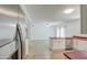 Kitchen with white cabinets, red countertops, and stainless steel appliances at 7431 W Ocotillo Rd, Glendale, AZ 85303