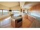 Kitchen with panoramic desert views, a large island, and sleek marble countertops at 8702 E Silver Saddle Dr, Carefree, AZ 85377