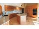 Spacious kitchen showcasing wood cabinetry, marble countertops, and stainless steel appliances at 8702 E Silver Saddle Dr, Carefree, AZ 85377