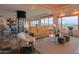 Spacious living room with comfortable furniture, an elevator, and desert views at 8702 E Silver Saddle Dr, Carefree, AZ 85377