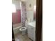 Bathroom with a bathtub, toilet, and white vanity at 1221 N 34Th St, Phoenix, AZ 85008