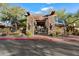 Inviting community entrance with stone accents and landscaping at 19777 N 76Th St # 1248, Scottsdale, AZ 85255