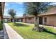 Well-maintained courtyard with grassy areas and mature trees at 2015 E Southern Ave # 26, Tempe, AZ 85282