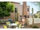 Patio with seating area and view of building at 28990 N White Feather Ln # 127, Scottsdale, AZ 85262