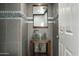 Modern powder room with glass vessel sink at 28990 N White Feather Ln # 127, Scottsdale, AZ 85262