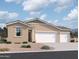 Charming single-story home with a three-car garage and desert landscaping at 46904 W Old Timer Rd, Maricopa, AZ 85139