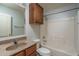 Bathroom with single vanity, toilet, and shower/tub combo at 5852 S 248Th Ln, Buckeye, AZ 85326