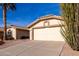 Front yard view of a single-story home with an attached garage at 8450 W Mcrae Way, Peoria, AZ 85382