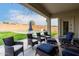Covered patio with seating area and view of a refreshing pool at 9982 W Villa Chula --, Peoria, AZ 85383