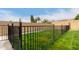 Landscaped backyard with black metal fence at 9982 W Villa Chula --, Peoria, AZ 85383