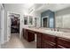 Double vanity bathroom with granite countertops and walk-in shower at 9982 W Villa Chula --, Peoria, AZ 85383