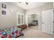 Spacious bedroom with mirrored closet doors and a twin bed at 9982 W Villa Chula --, Peoria, AZ 85383