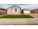 Beautiful one-story home with a two-car garage and landscaped lawn at 9982 W Villa Chula --, Peoria, AZ 85383