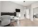Bright home office with built-in desk and adjacent bathroom access at 9982 W Villa Chula --, Peoria, AZ 85383