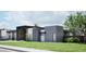 Contemporary home with gray and white exterior and landscaping at 10420 N 64Th Pl, Paradise Valley, AZ 85253