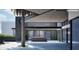 Modern outdoor kitchen area with built-in grill and bar at 10420 N 64Th Pl, Paradise Valley, AZ 85253