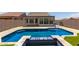 Relaxing backyard retreat with a pool, a spa, and a paved patio area at 10666 E Peralta Canyon Dr, Gold Canyon, AZ 85118